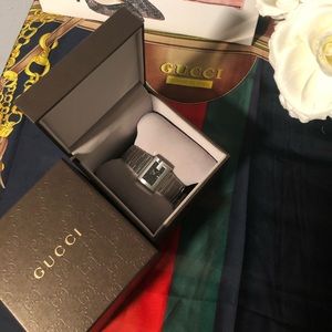 Authentic Gucci black watch with G Bezel